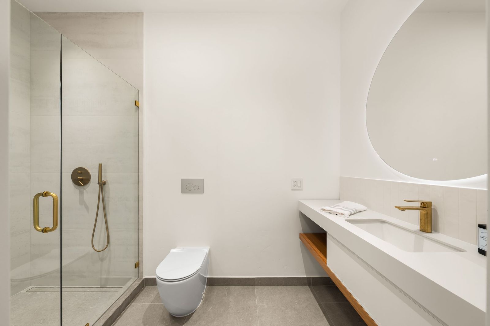 ADU full bath with walk-in shower and floating vanity