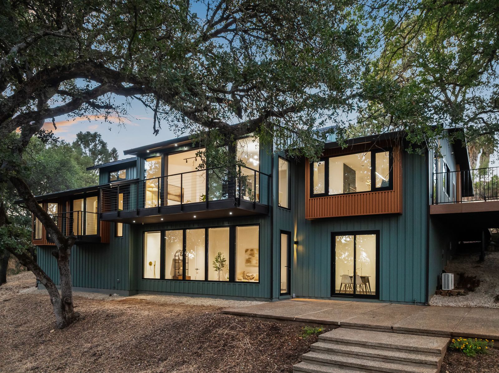 Twilight exterior of the modern foothill retreat
